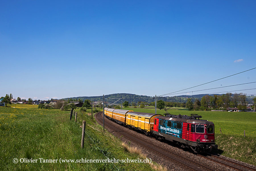 Re 420 345 ’’Wartung mit Durchblick’’ mit einem Postzug Richtung Gossau SG